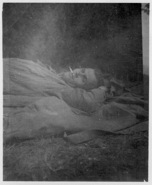 Lt Thomas on his back as usual--Day after Arno River.jpg